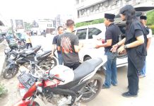 Aksi Jumat Berbagi, Perisai Banten DPC Kota Serang Bagikan Ratusan Nasi Bungkus